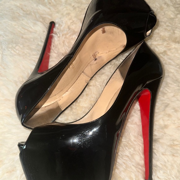Christian Louboutin - Picture 1 of 4